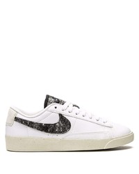 Baskets basses en cuir blanches et noires Nike