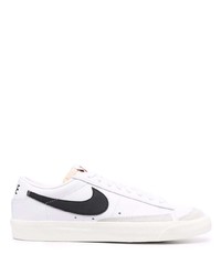 Baskets basses en cuir blanches et noires Nike