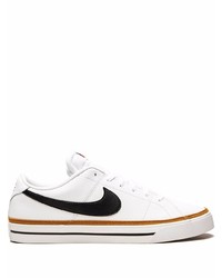 Baskets basses en cuir blanches et noires Nike