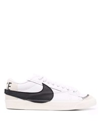 Baskets basses en cuir blanches et noires Nike