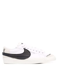 Baskets basses en cuir blanches et noires Nike