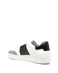 Baskets basses en cuir blanches et noires Sandro Paris