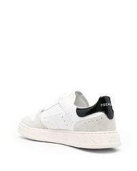 Baskets basses en cuir blanches et noires Premiata