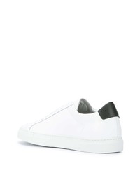 Baskets basses en cuir blanches et noires Common Projects