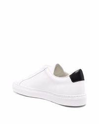 Baskets basses en cuir blanches et noires Common Projects