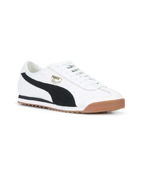 Baskets basses en cuir blanches et noires Puma