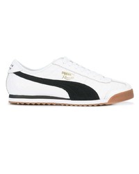 Baskets basses en cuir blanches et noires Puma