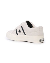 Baskets basses en cuir blanches et noires Converse