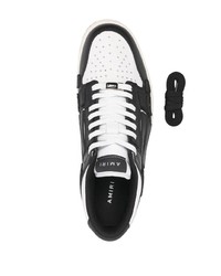 Baskets basses en cuir blanches et noires Amiri