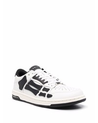 Baskets basses en cuir blanches et noires Amiri