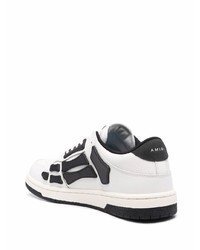 Baskets basses en cuir blanches et noires Amiri