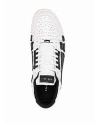 Baskets basses en cuir blanches et noires Amiri