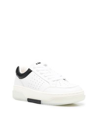 Baskets basses en cuir blanches et noires Amiri