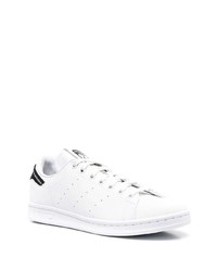 Baskets basses en cuir blanches et noires adidas