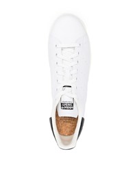 Baskets basses en cuir blanches et noires adidas