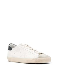 Baskets basses en cuir blanches et noires Golden Goose