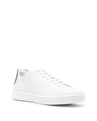 Baskets basses en cuir blanches et noires Moschino