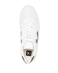 Baskets basses en cuir blanches et noires Veja