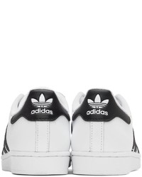 Baskets basses en cuir blanches et noires adidas Originals