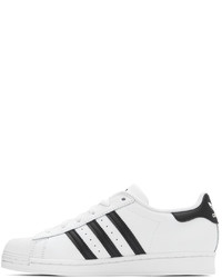 Baskets basses en cuir blanches et noires adidas Originals