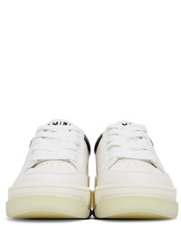 Baskets basses en cuir blanches et noires Amiri