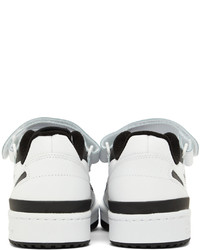 Baskets basses en cuir blanches et noires adidas Originals