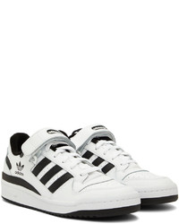 Baskets basses en cuir blanches et noires adidas Originals