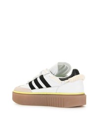 Baskets basses en cuir blanches et noires adidas