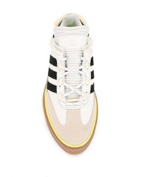 Baskets basses en cuir blanches et noires adidas