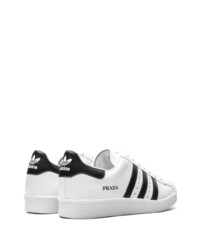 Baskets basses en cuir blanches et noires adidas