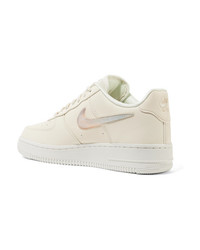 Baskets basses en cuir blanches Nike