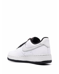 Baskets basses en cuir blanches Nike