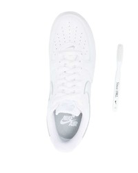 Baskets basses en cuir blanches Nike