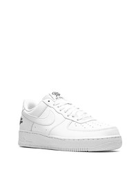 Baskets basses en cuir blanches Nike