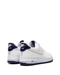 Baskets basses en cuir blanches Nike