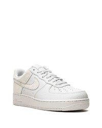 Baskets basses en cuir blanches Nike