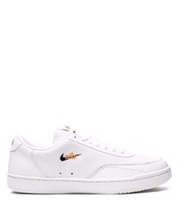 Baskets basses en cuir blanches Nike