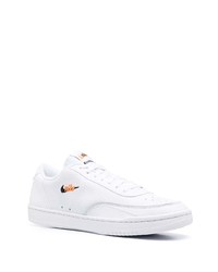 Baskets basses en cuir blanches Nike