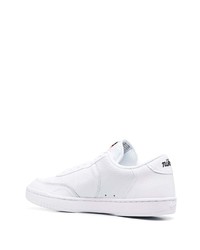 Baskets basses en cuir blanches Nike