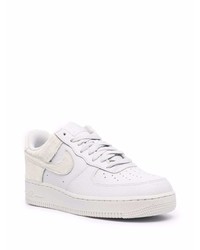 Baskets basses en cuir blanches Nike