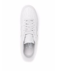 Baskets basses en cuir blanches Nike