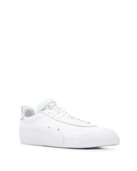 Baskets basses en cuir blanches Nike