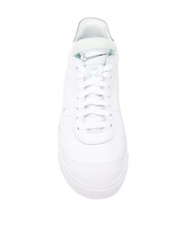 Baskets basses en cuir blanches Nike