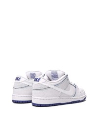 Baskets basses en cuir blanches Nike