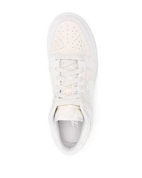 Baskets basses en cuir blanches Nike