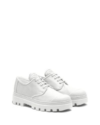 Baskets basses en cuir blanches Prada