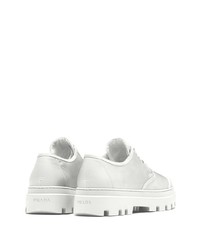 Baskets basses en cuir blanches Prada