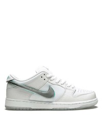 Baskets basses en cuir blanches Nike