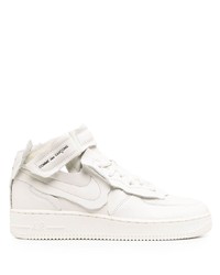 Baskets basses en cuir blanches Nike