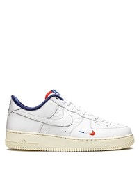 Baskets basses en cuir blanches Nike